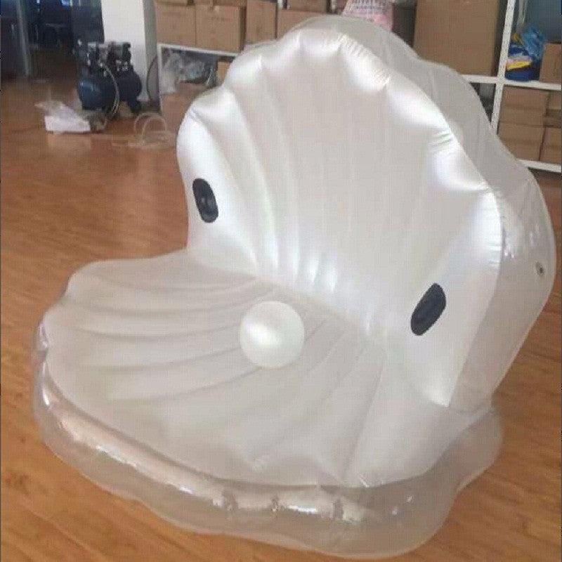 Giant Inflatable Shell Floating Bed | Little Miss Meteo