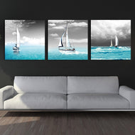 White Sailing Boat Vogue in the Blue Sea (3 pcs)